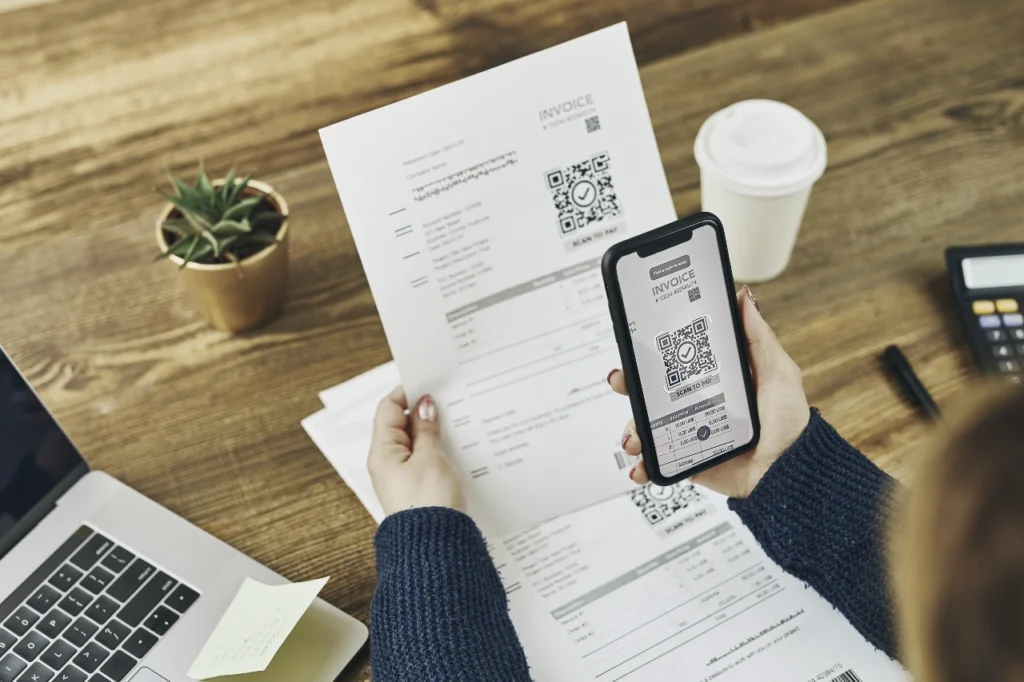 scanning-qr-code-from-invoice-to-make-payment-usin-2023-11-27-05-06-55-utc
