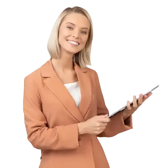 square_4_media A woman in a tan blazer and white top is smiling and holding a tablet, pointing at the screen. media_agency square_4_media A woman in a tan blazer and white top is smiling and holding a tablet, pointing at the screen. media_agency